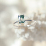 Rectangle shaped natural moss agate gemstone ring in a solid sterling silver setting with a smooth, round band.